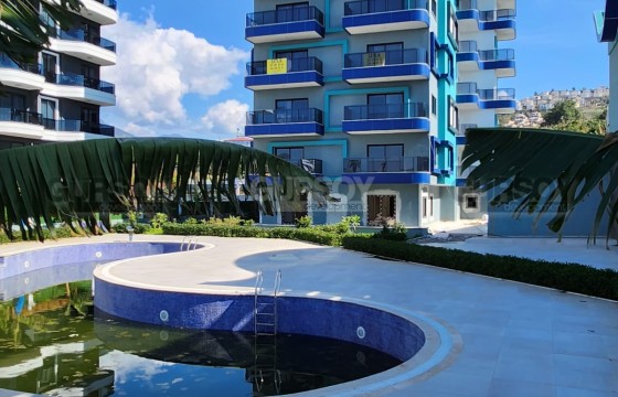 Меблированная квартира 1+1 в новом доме в 100 метрах от моря по низкой цене в Турции - фото 9