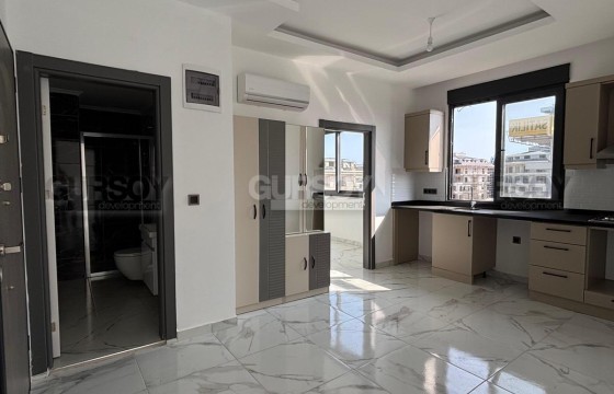 Новая квартира 1+1 с видом на море в районе Каргыджак в Турции - фото 5