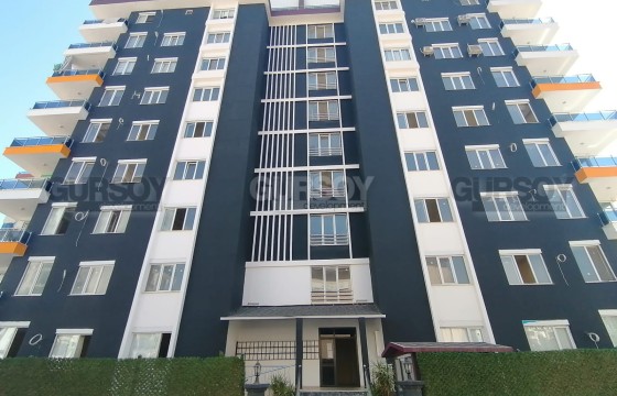 Квартира 1+1 по выгодной цене рядом с городской инфраструктурой в Турции - фото 1