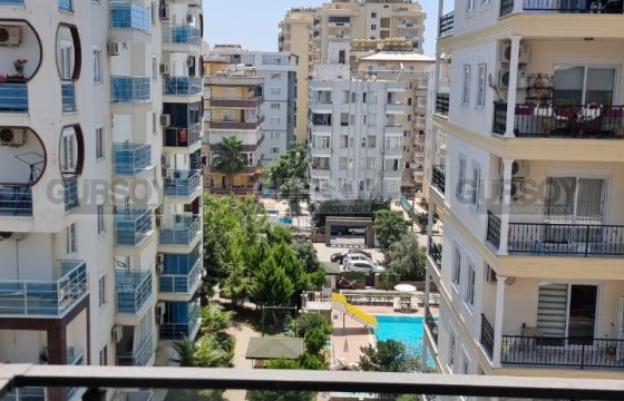 Квартира 1+1 в самом центре Махмутлара в Турции - фото 2