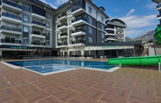 Двухэтажная квартира 2+1 с новой мебелью и техникой в качественном комплексе в Турции - фото 2