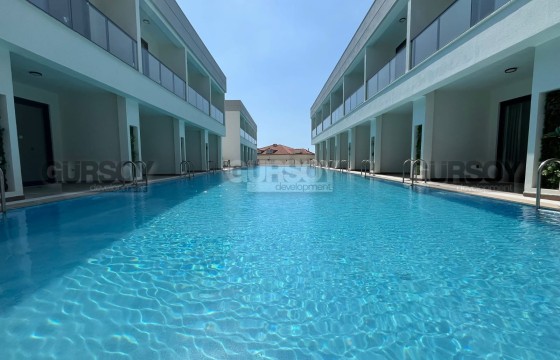 Дуплекс 2+1 с выходом к бассейну в комплексе с уникальной концепцией в Турции - фото 4