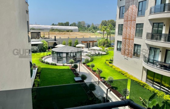 Современная квартира планировкой 1+1 в престижном комплексе с полной инфраструктурой в Турции - фото 12