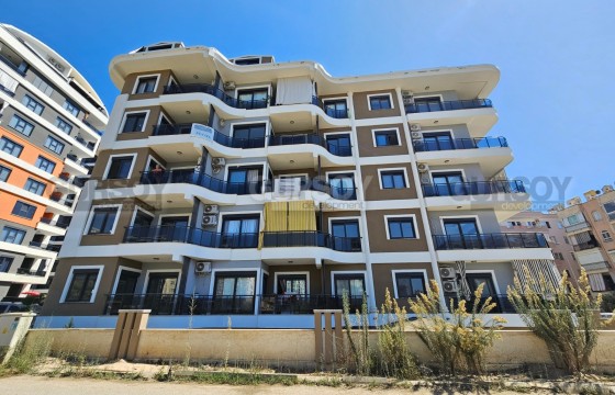 Просторная новая квартира 1+1 в центре Махмутлара в удобной локации в Турции - фото 4