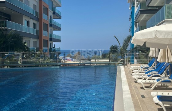 Меблированная квартира 2+1 в премиальном комплексе с собственным пляжем в Турции - фото 2