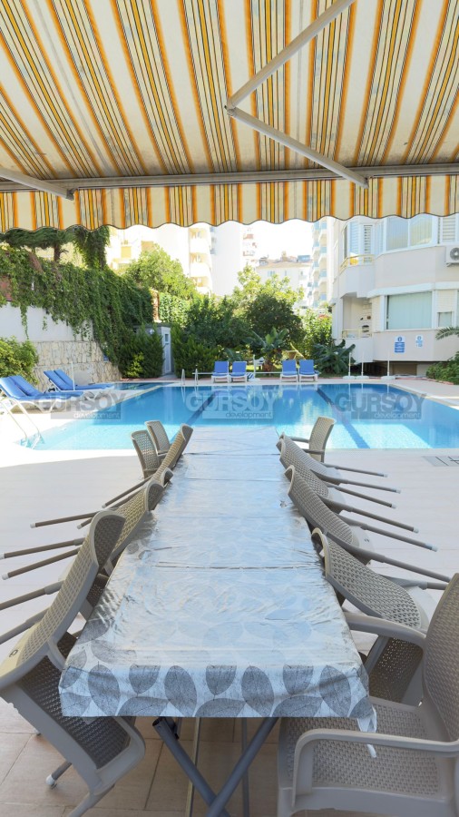 Меблированная квартира в доме с бассейном рядом с песчаным пляжем в Турции - фото 1 Меблированная квартира в доме с бассейном рядом с песчаным пляжем в Турции - фото 1