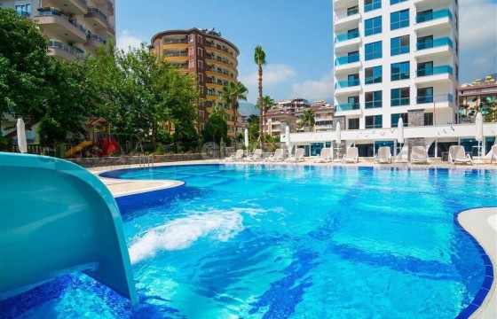 Меблированная квартира 1+1 с видом на море в популярном жилом комплексе у пляжа Клеопатра в Турции - фото 5