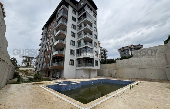 Современная квартира 2+1 в новом комплексе с отдельной кухней в Турции - фото 9