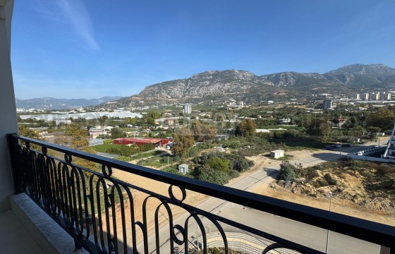 Новая квартира 1+1 с видом на горы в комплексе отельного уровня в Турции - фото 5