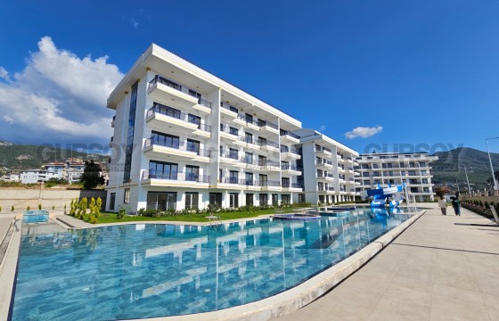 Современная квартира 1+1 в районе Oba, Аланья — новый комплекс 2025 года с курортной инфраструктурой в Турции - фото 2