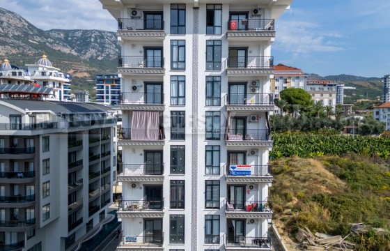 Недорогая квартира 1+1 в Махмутларе в комплексе с инфраструктурой в Турции - фото 1