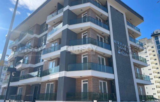 Инвестиционная квартира 1+1 в новом доме рядом с морем в Турции - фото 1