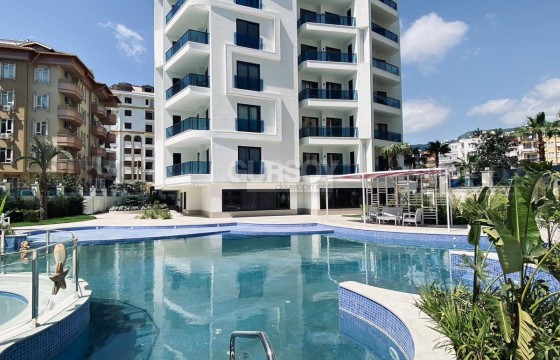 Современная 2+1 в комплексе отельного типа в центре Алании в Турции - фото 9