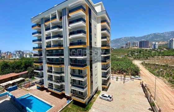 Меблированная квартира 1+1 рядом с морем в ухоженном комплексе, Махмутлар в Турции - фото 3