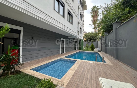 Недорогая квартира в новом доме у пляжа Клеопатра в Турции - фото 4