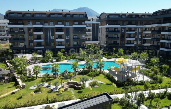 Современная квартира 1+1 в новом комплексе в районе Оба в Турции - фото 5