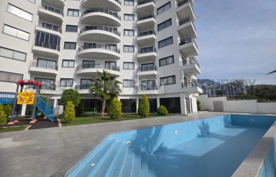 Квартира 1+1 в Махмутларе за разумную цену в Турции - фото 4