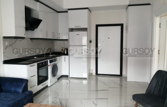 Апартаменты 1+1 в новом доме в районе Хаджет, 63 м2 в Турции - фото 4