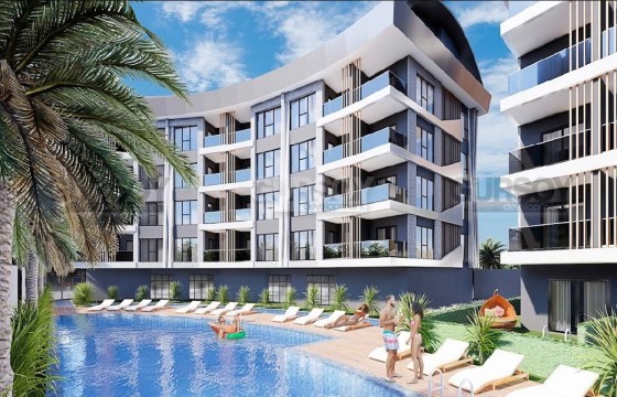 Новый проект в 450 метрах от моря в районе Конаклы, 50 м2-110 м2 в Турции - фото 1