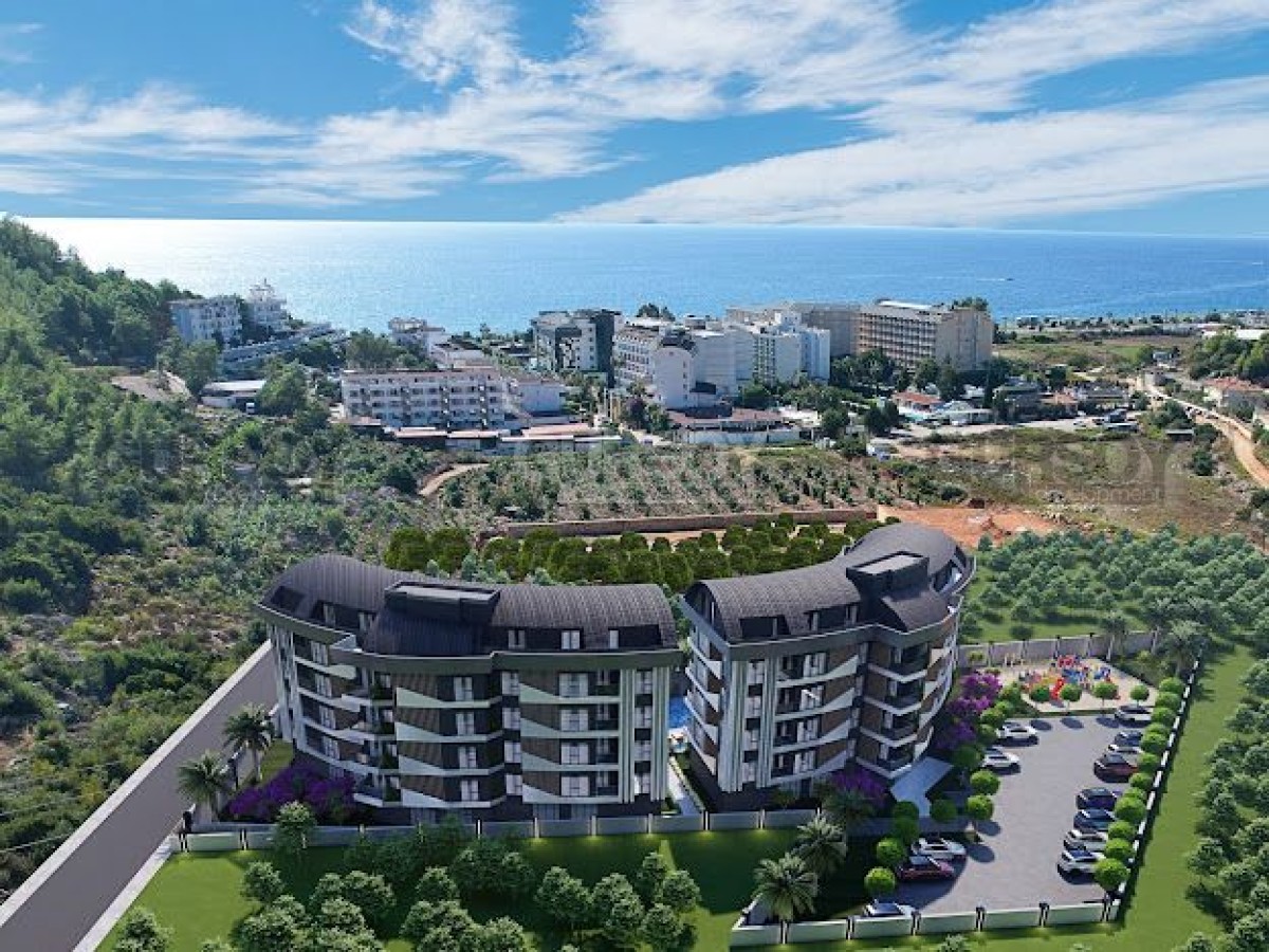 Новый проект в 450 метрах от моря в районе Конаклы, 50 м2-110 м2 в Турции - фото 1