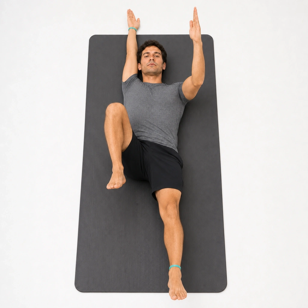 Dead Bug - Contralateral - Step 2 of 7: Simultaneously extend right arm overhead and left leg out