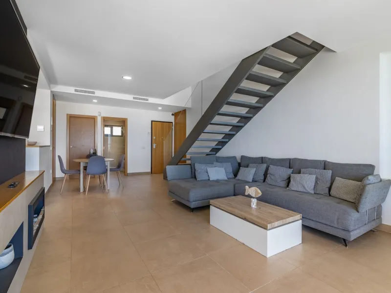 This stunning two-story villa boasts four spacious bedrooms, each with fitted wardrobes, electric blinds, and individual air conditioning control. The three elegant bathrooms feature the comfort of underfloor heating.