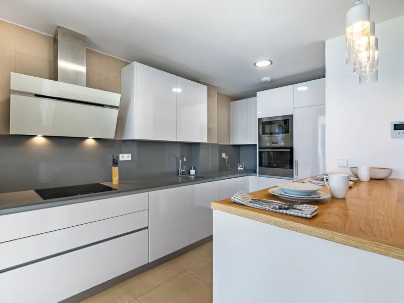 This stunning two-story villa boasts four spacious bedrooms, each with fitted wardrobes, electric blinds, and individual air conditioning control. The three elegant bathrooms feature the comfort of underfloor heating.