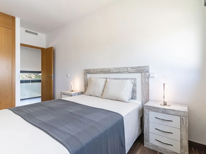 This stunning two-story villa boasts four spacious bedrooms, each with fitted wardrobes, electric blinds, and individual air conditioning control. The three elegant bathrooms feature the comfort of underfloor heating.
