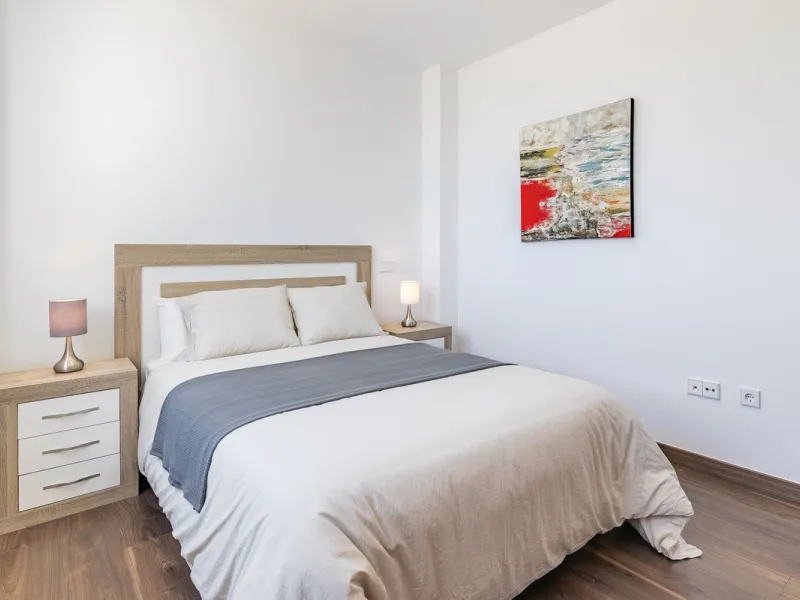 This stunning two-story villa boasts four spacious bedrooms, each with fitted wardrobes, electric blinds, and individual air conditioning control. The three elegant bathrooms feature the comfort of underfloor heating.