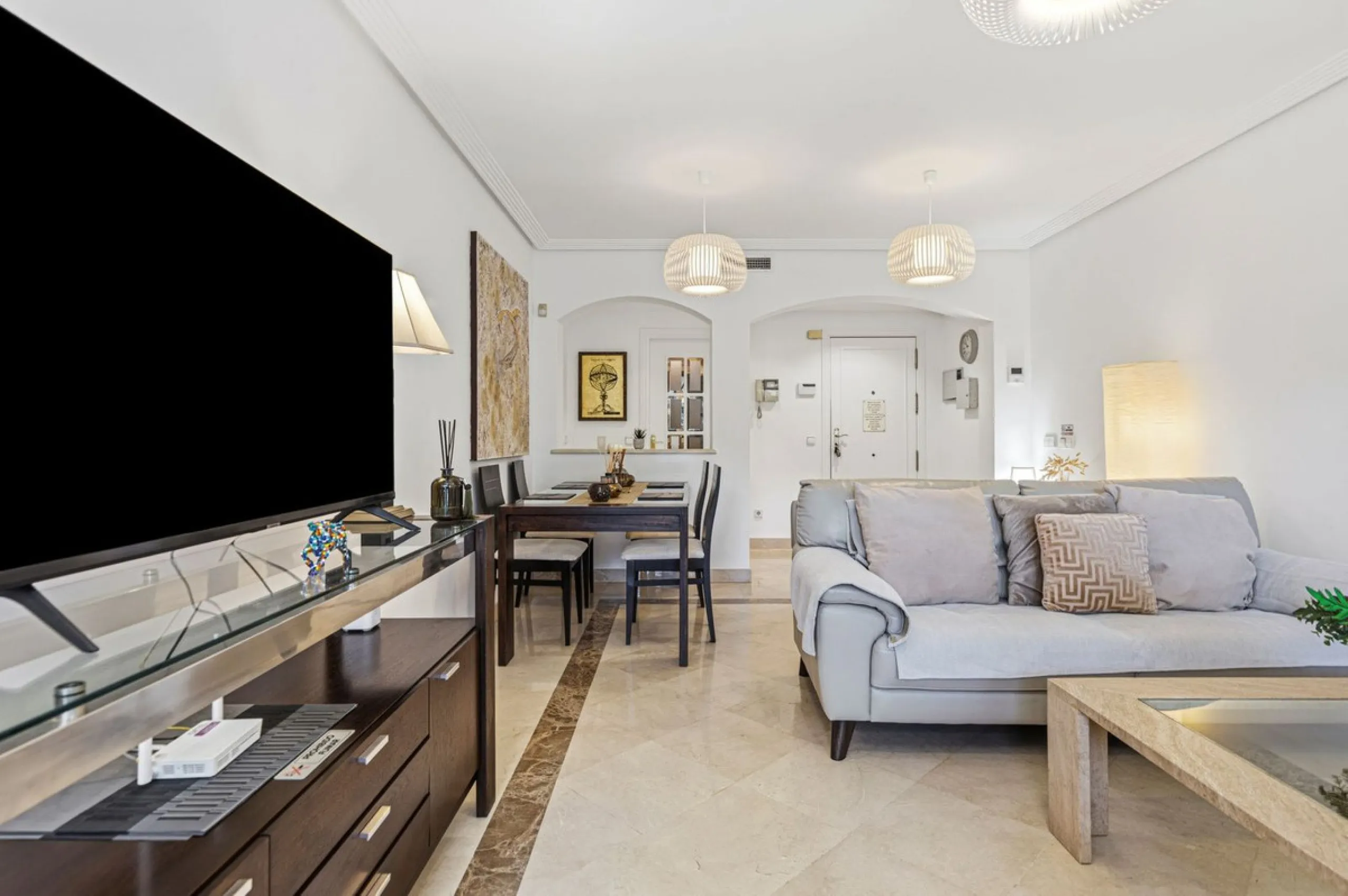 Beautifully maintained and move-in ready, this ground-floor apartment is located in Las Torres de Los Arqueros, one of the most established and well-kept communities within Los Arqueros.