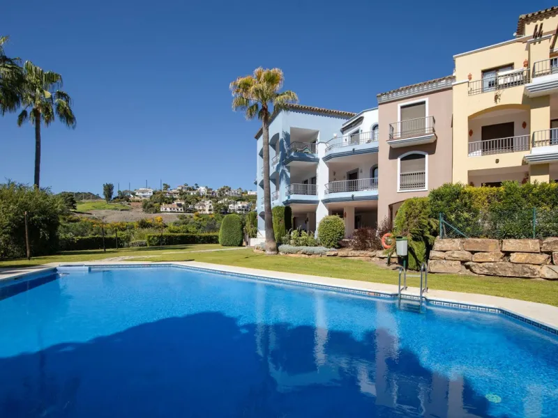 Beautifully maintained and move-in ready, this ground-floor apartment is located in Las Torres de Los Arqueros, one of the most established and well-kept communities within Los Arqueros.