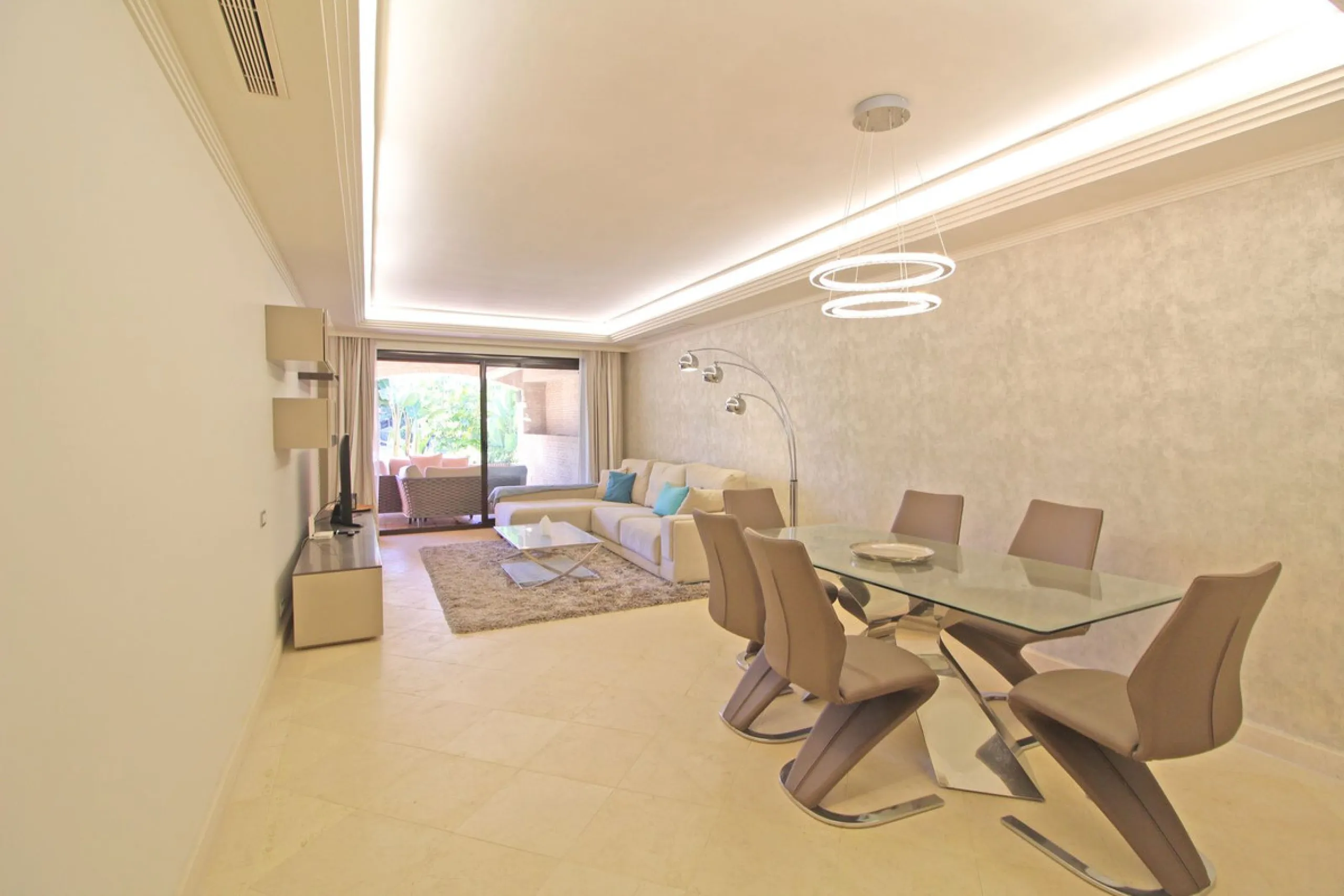 Nestled in the peaceful beachside enclave of Casasola, this charming ground-floor apartment