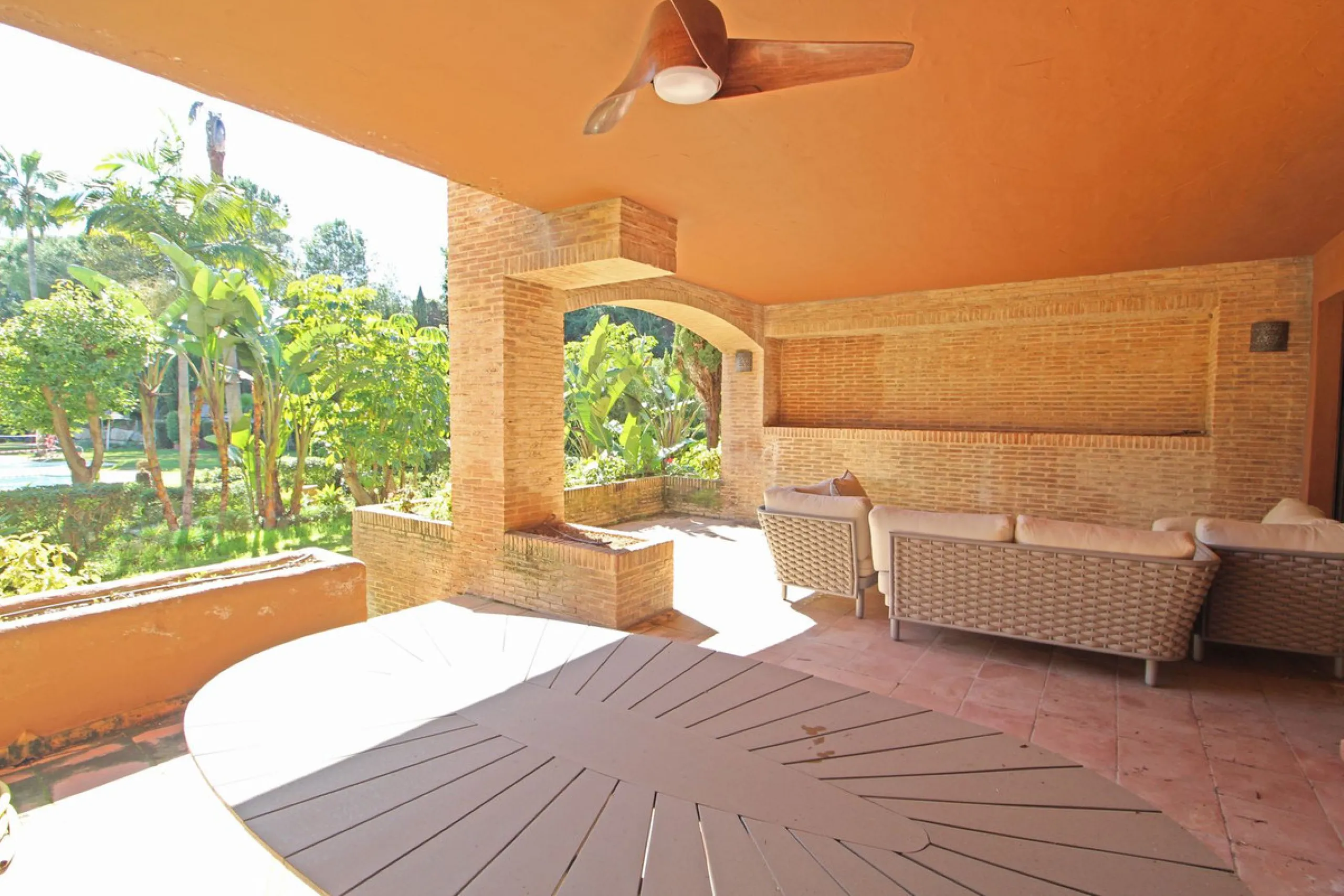 Nestled in the peaceful beachside enclave of Casasola, this charming ground-floor apartment