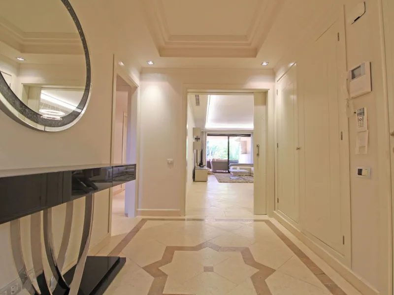Nestled in the peaceful beachside enclave of Casasola, this charming ground-floor apartment