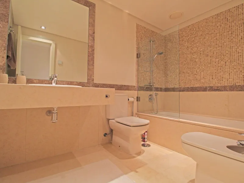 Nestled in the peaceful beachside enclave of Casasola, this charming ground-floor apartment