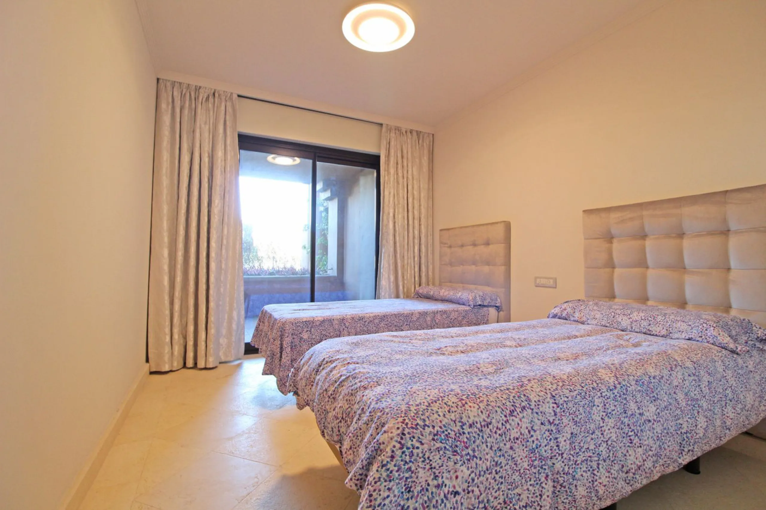 Nestled in the peaceful beachside enclave of Casasola, this charming ground-floor apartment