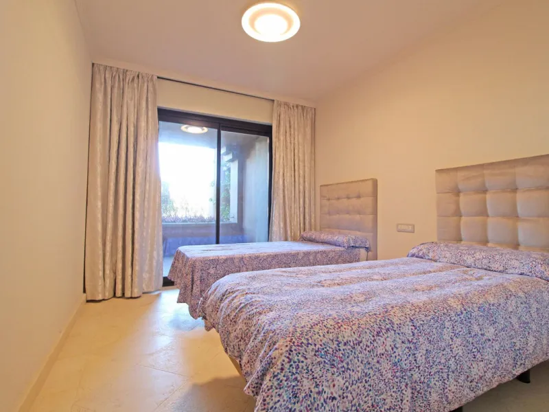 Nestled in the peaceful beachside enclave of Casasola, this charming ground-floor apartment