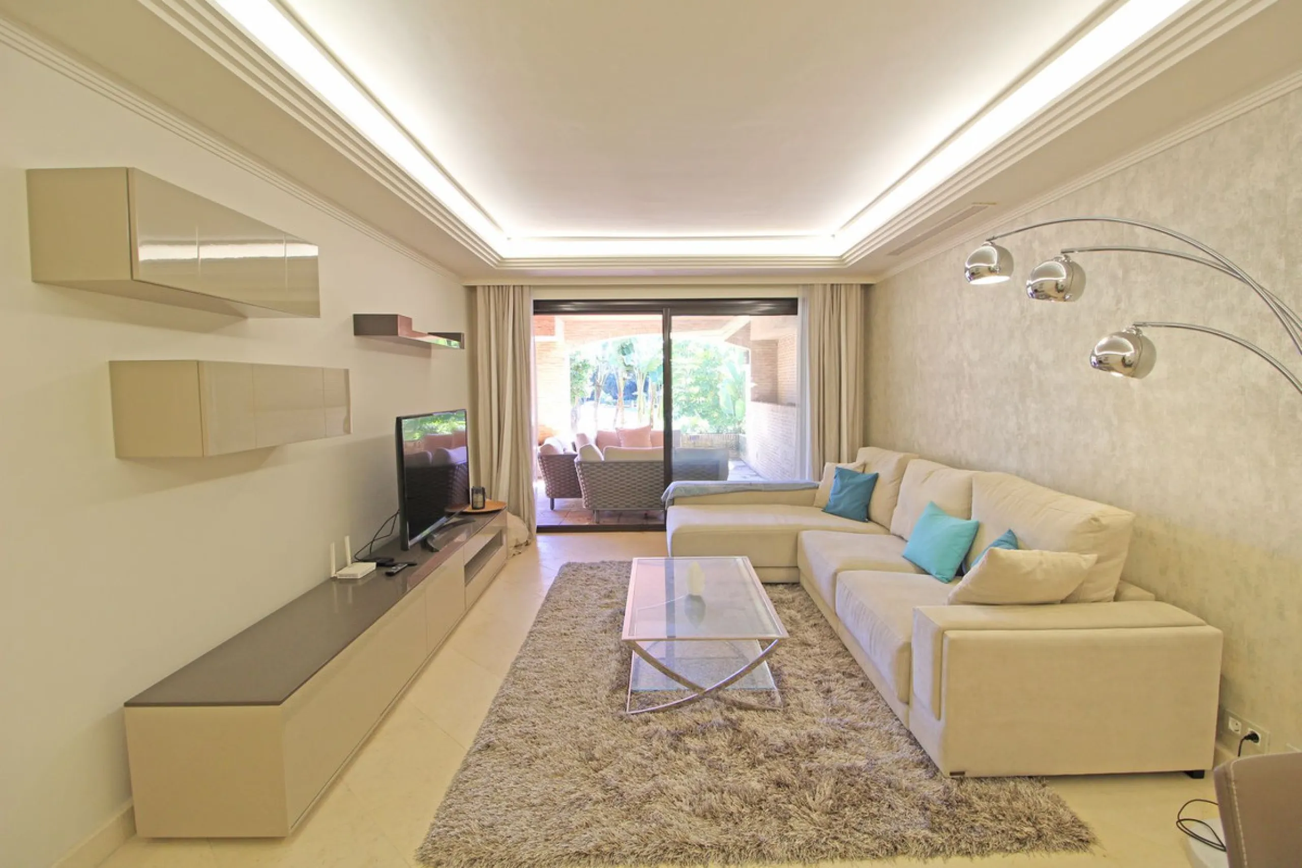Nestled in the peaceful beachside enclave of Casasola, this charming ground-floor apartment