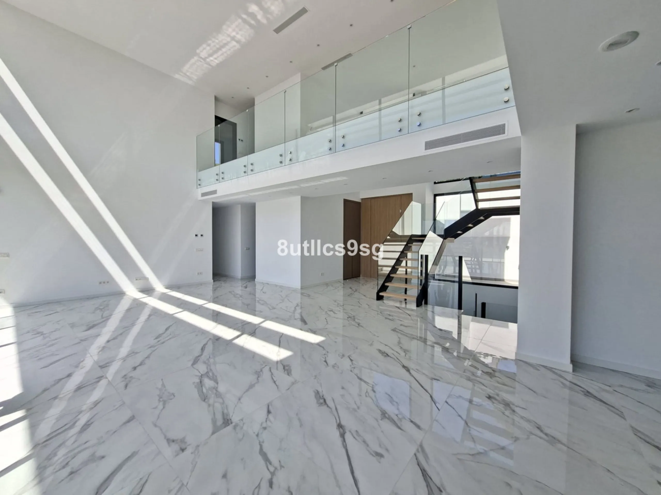 This contemporary villa is situated in the sought-after area of Paraiso Alto, Benahavis, Malaga. The property offers six bedrooms and eight bathrooms, including six en-suite, and stands out for its generous proportions with a built area of 1,038m² and a p