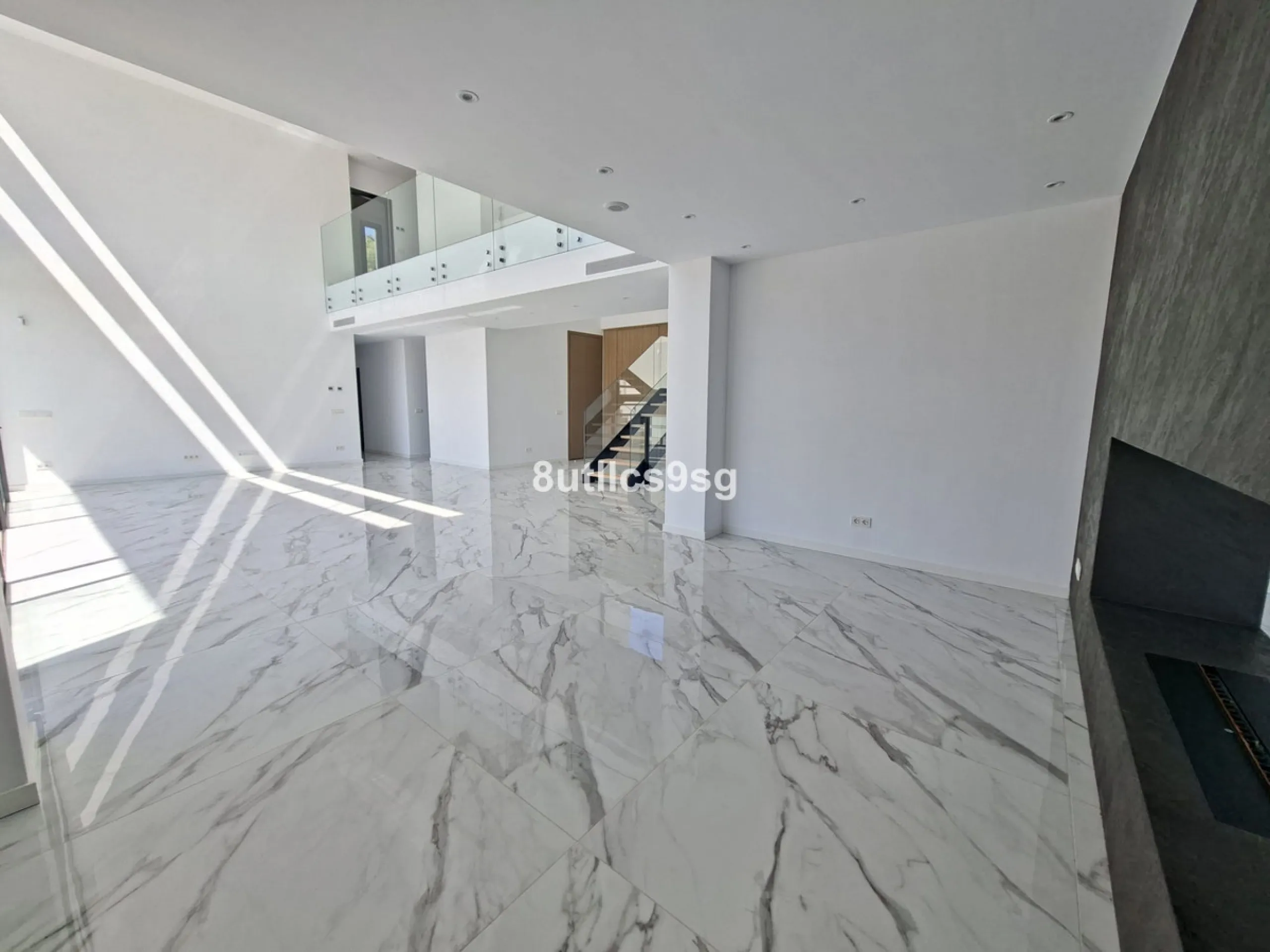 This contemporary villa is situated in the sought-after area of Paraiso Alto, Benahavis, Malaga. The property offers six bedrooms and eight bathrooms, including six en-suite, and stands out for its generous proportions with a built area of 1,038m² and a p
