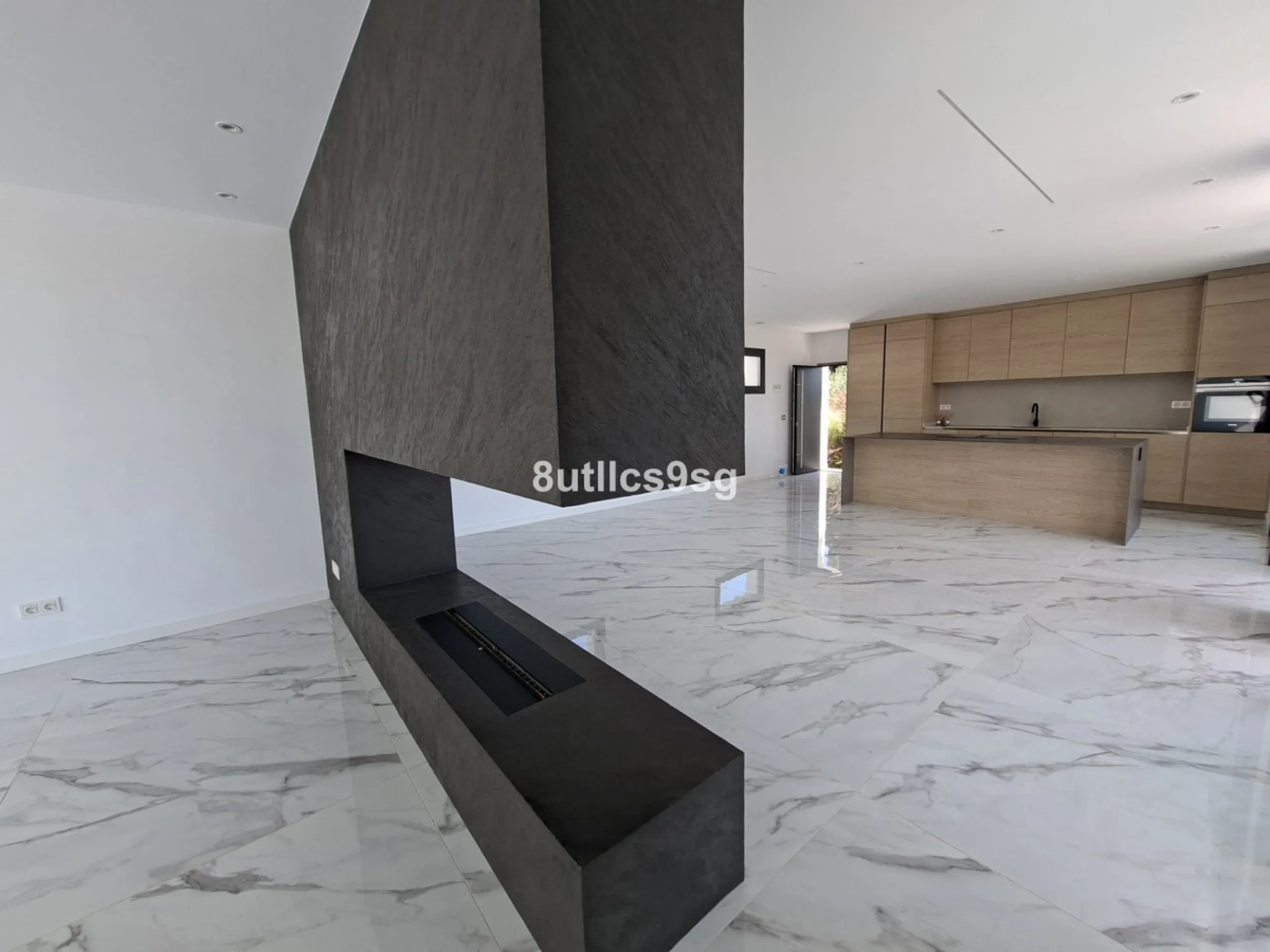 This contemporary villa is situated in the sought-after area of Paraiso Alto, Benahavis, Malaga. The property offers six bedrooms and eight bathrooms, including six en-suite, and stands out for its generous proportions with a built area of 1,038m² and a p
