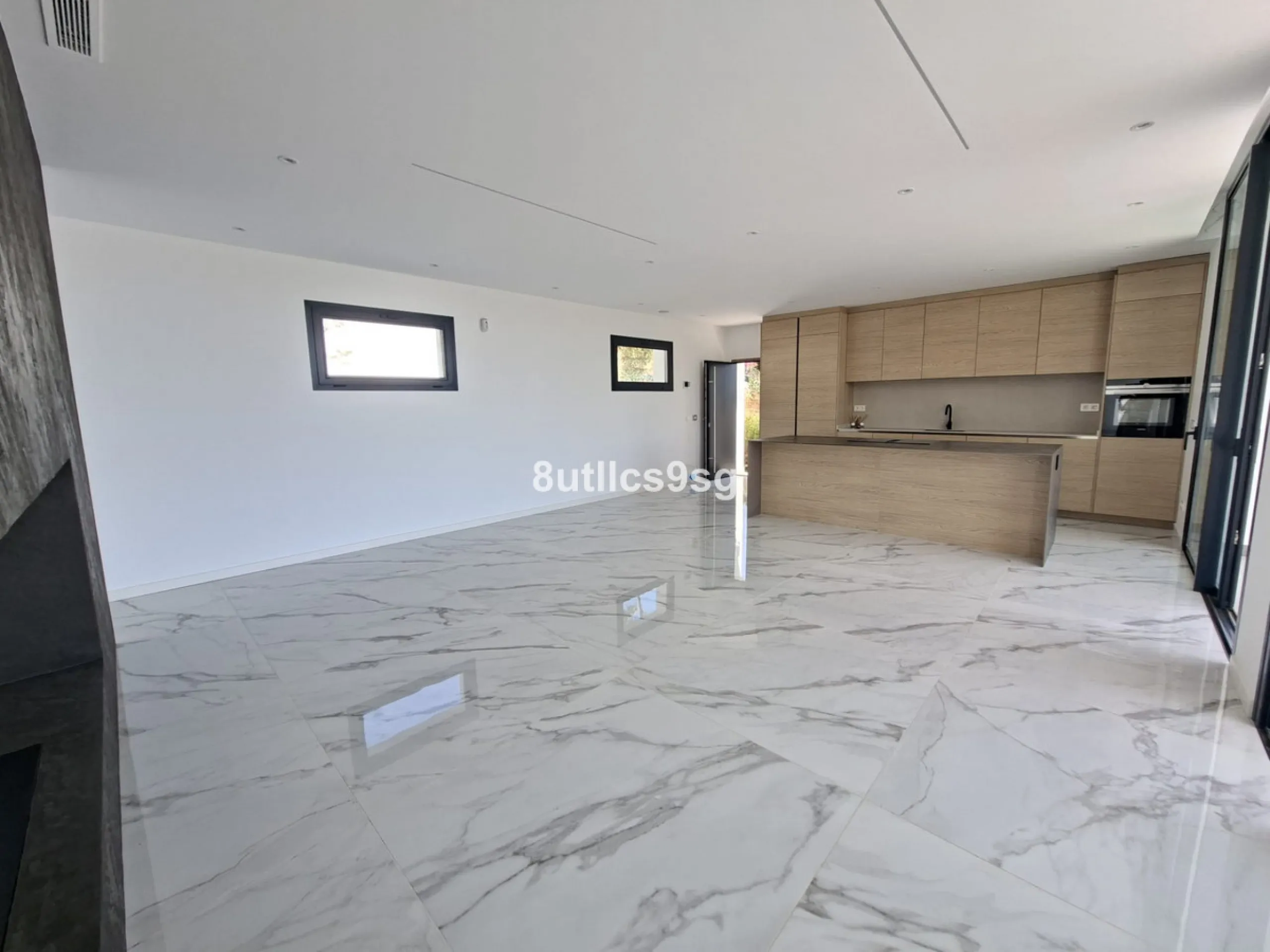 This contemporary villa is situated in the sought-after area of Paraiso Alto, Benahavis, Malaga. The property offers six bedrooms and eight bathrooms, including six en-suite, and stands out for its generous proportions with a built area of 1,038m² and a p