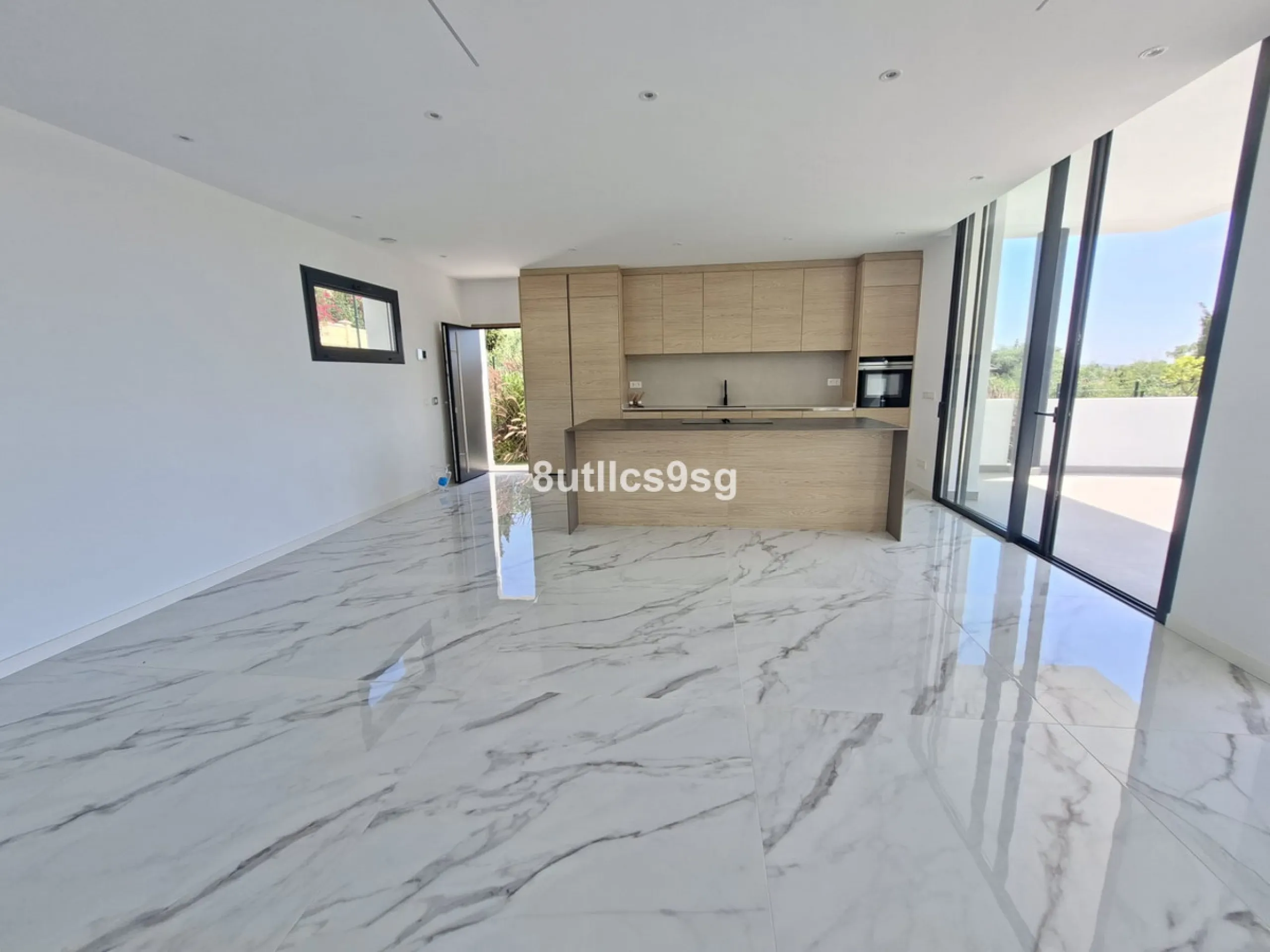 This contemporary villa is situated in the sought-after area of Paraiso Alto, Benahavis, Malaga. The property offers six bedrooms and eight bathrooms, including six en-suite, and stands out for its generous proportions with a built area of 1,038m² and a p