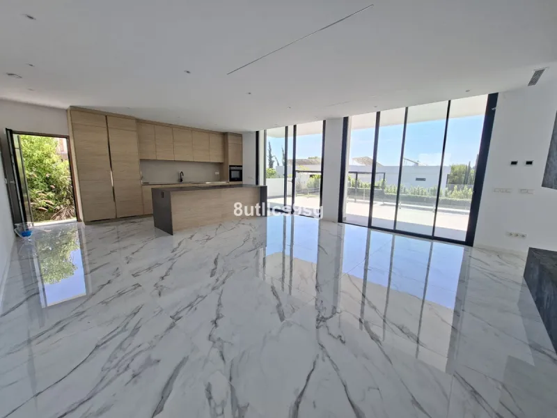This contemporary villa is situated in the sought-after area of Paraiso Alto, Benahavis, Malaga. The property offers six bedrooms and eight bathrooms, including six en-suite, and stands out for its generous proportions with a built area of 1,038m² and a p