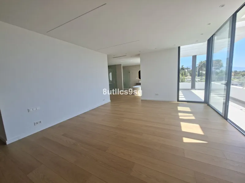 This contemporary villa is situated in the sought-after area of Paraiso Alto, Benahavis, Malaga. The property offers six bedrooms and eight bathrooms, including six en-suite, and stands out for its generous proportions with a built area of 1,038m² and a p