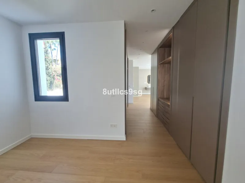 This contemporary villa is situated in the sought-after area of Paraiso Alto, Benahavis, Malaga. The property offers six bedrooms and eight bathrooms, including six en-suite, and stands out for its generous proportions with a built area of 1,038m² and a p