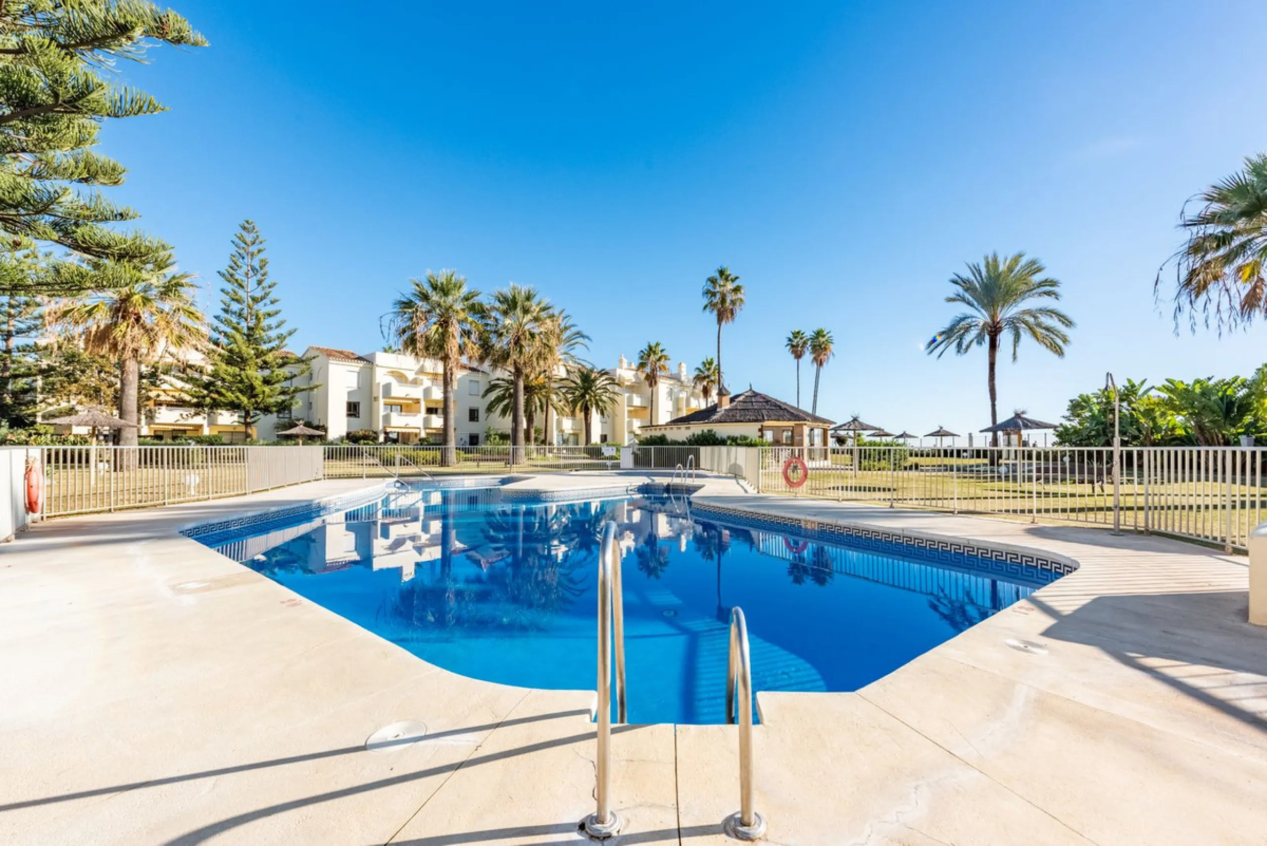 Beachfront Top-Floor Apartment – Prime Investment with Short-Term Rentals allowed
