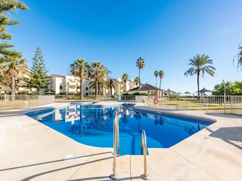 Beachfront Top-Floor Apartment – Prime Investment with Short-Term Rentals allowed