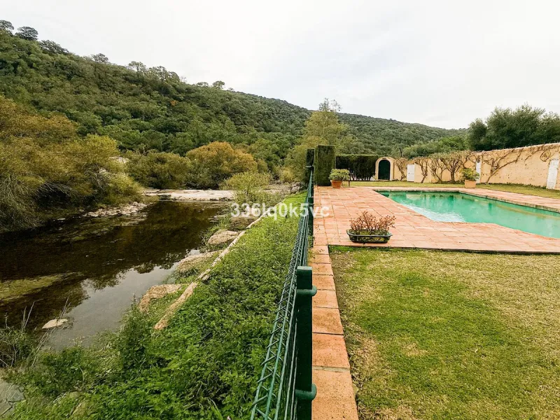 Discover this characterful, traditional Spanish-style villa in an exceptional location in Benahavís, set right beside the river. The villa offers five spacious bedrooms and three bathrooms, making it ideal for those looking for a generous family home or a