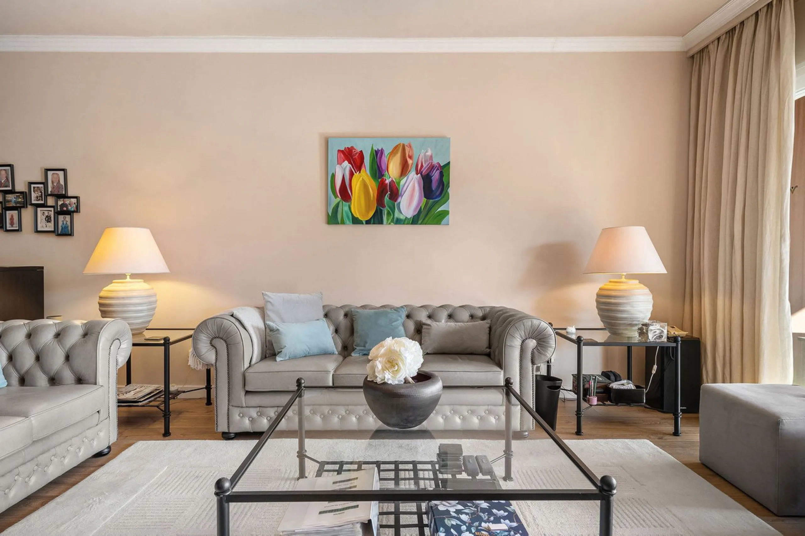 Just a short walk from the beach, this spacious two-bedroom apartment offers direct access to the beautifully maintained garden and swimming pool via a wide private terrace.